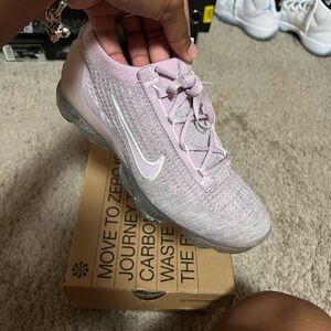 Nike Pink Athletic Shoes with Knit Upper and Sleek Design